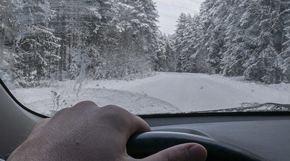 Image of a streaky windshield from inside a vehicle